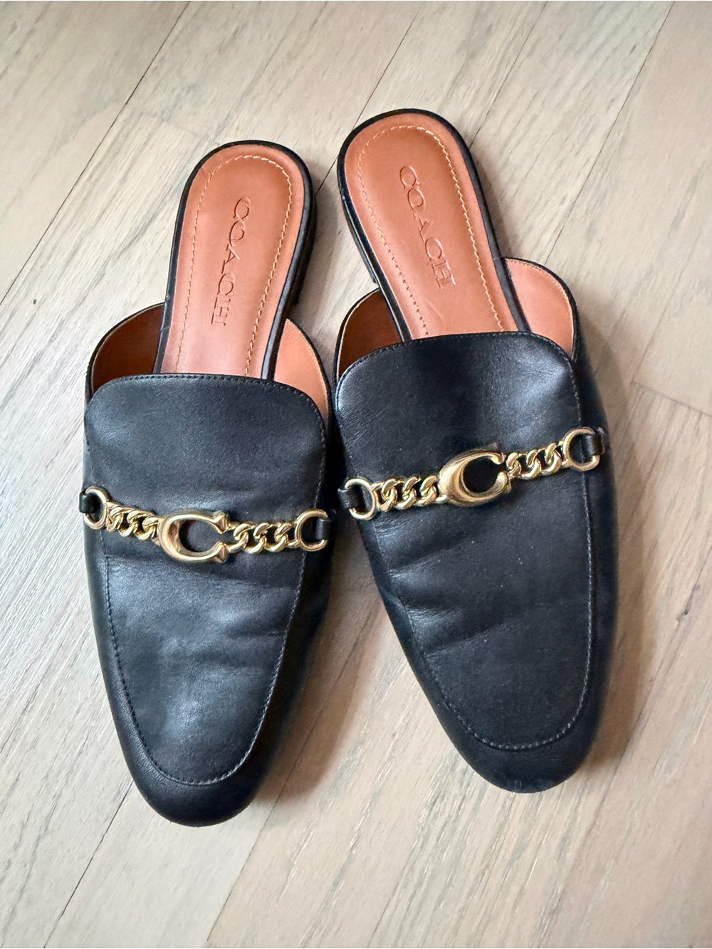 Coach Black Leather Slip-On Mules with Gold Chain Trim
